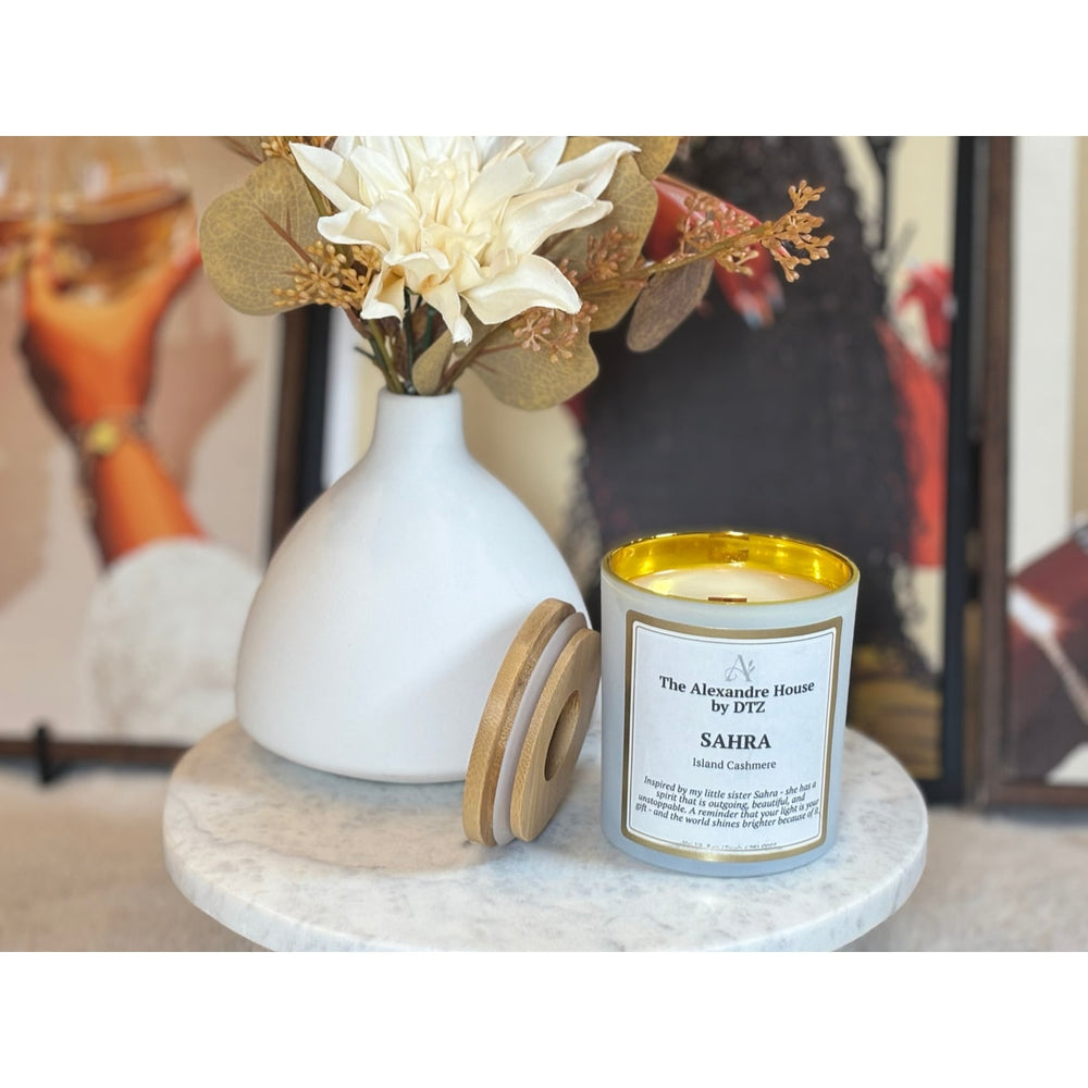 Sahra | Island Cashmere Signature Candle (8 oz) A warm, radiant luxury candle in a crackling wood wick