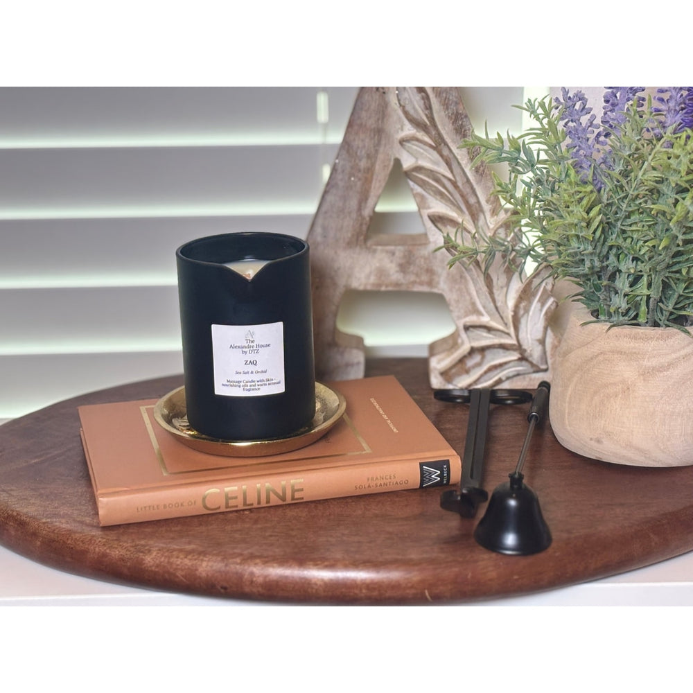 Zaq | Sea Salt & Orchid Massage Candle (8 oz) — A nourishing coconut-soy wax blend that melts into a warm skin moisturizer.